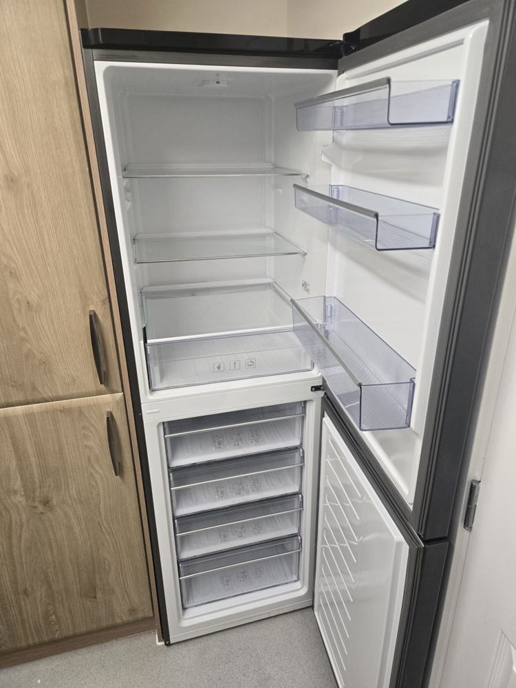 Fridge freezer installed and levelled