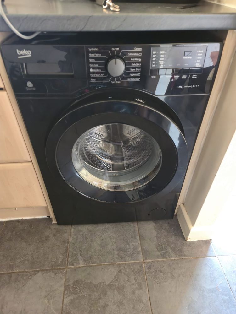 Washing machine installed in a Midlands kitchen
