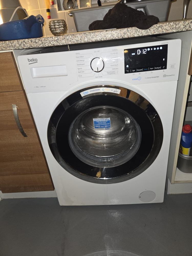 Fridge freezer installed and levelled